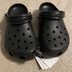 Brand New Classic Crocs in Black. Women’s size 8 / Men’s size 6.